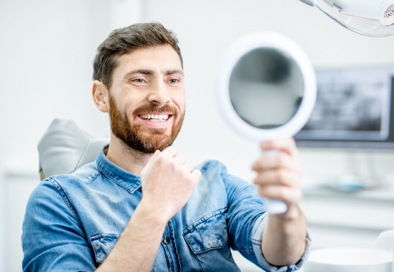 why choose man looking at new smile